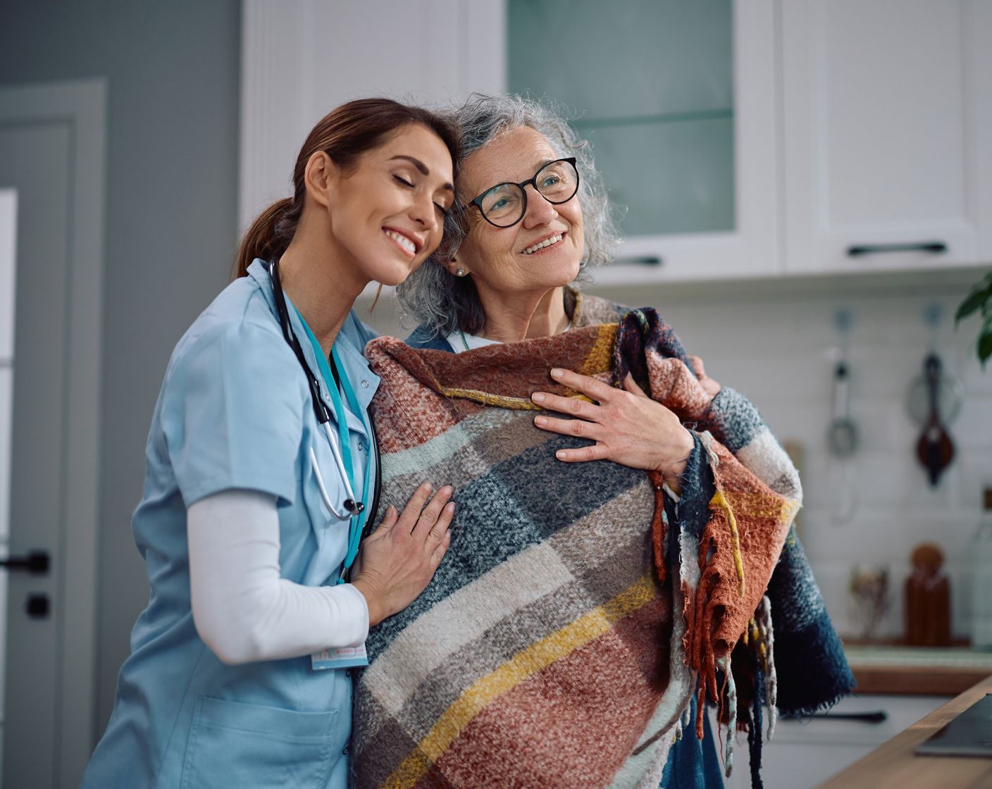 A loving caregiver with a senior resident